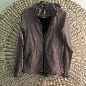 Vintage Lululemon windbreaker.  Pink and black stripped Size 6